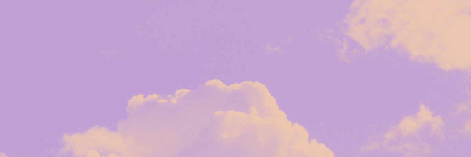 Pink sky with white clouds