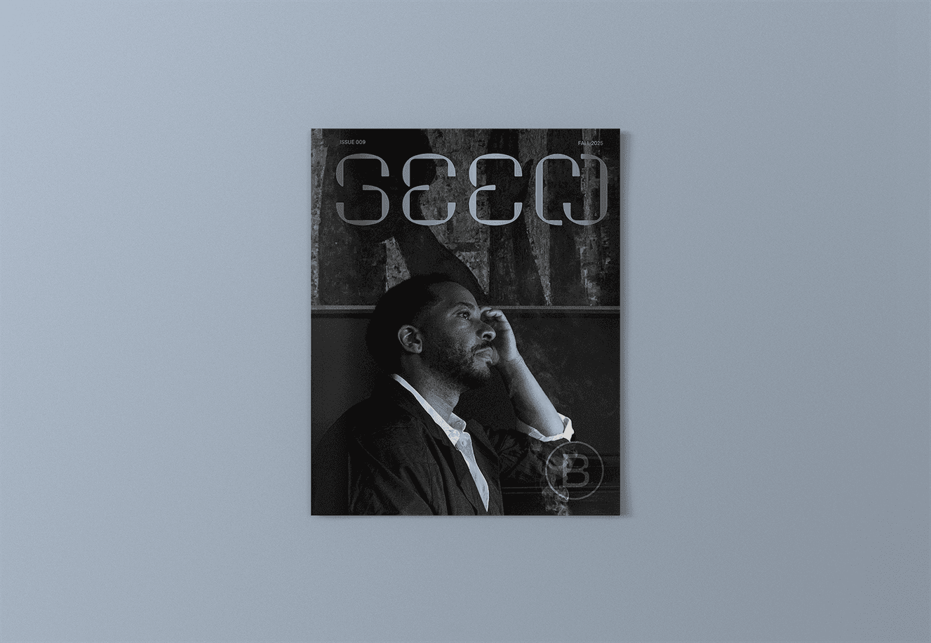 The cover of Seen 009 featuring actor André Holland against a blue-gray backround.