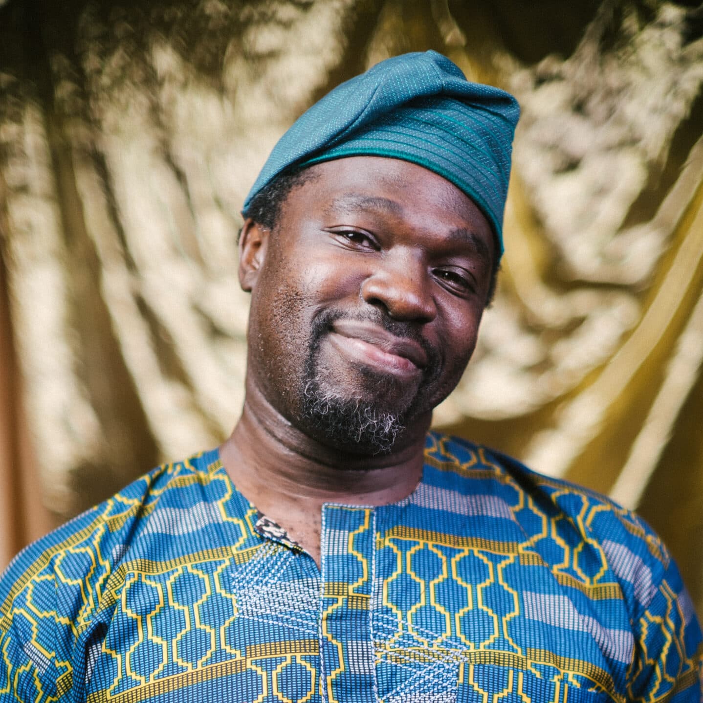 Headshot of Oluwafemi.