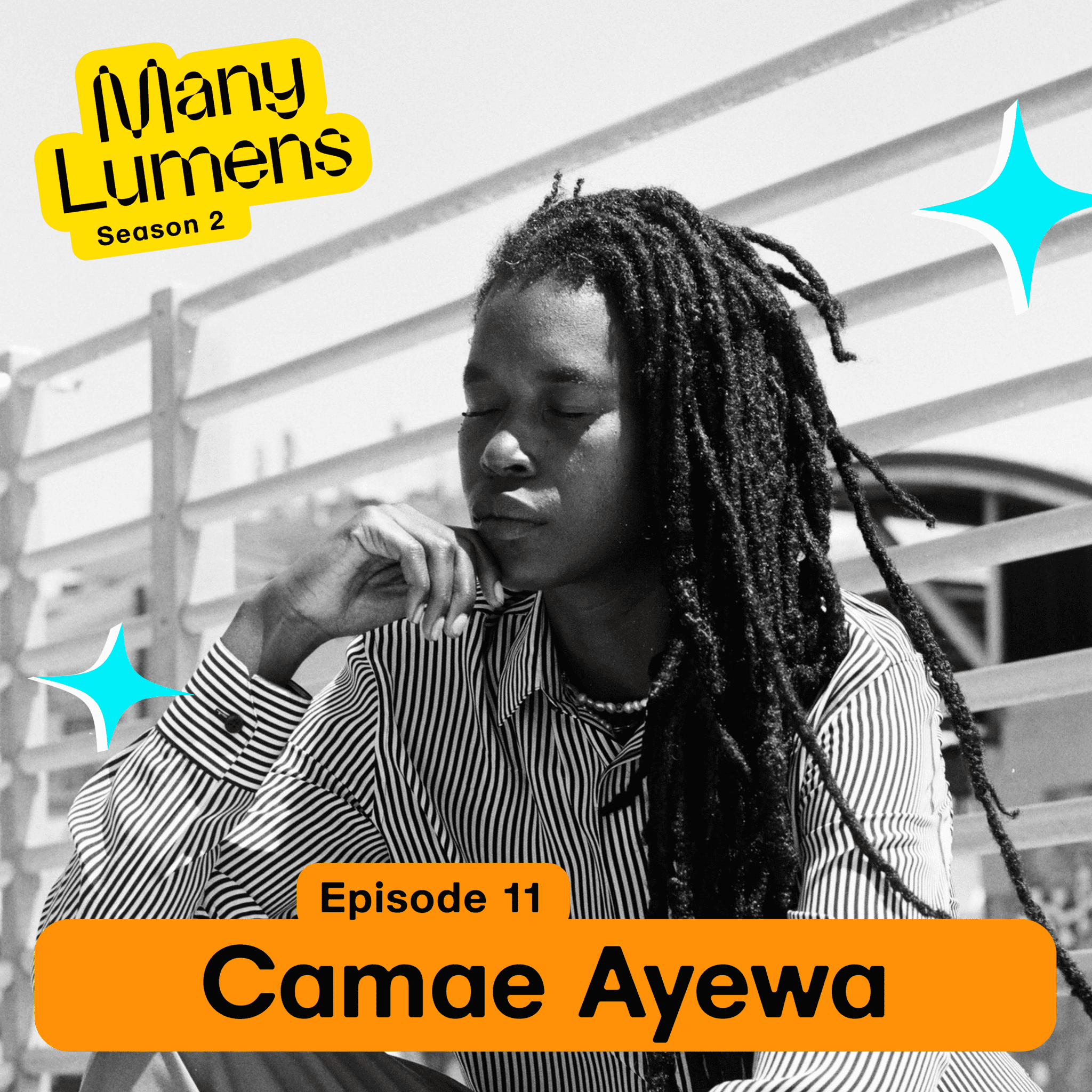 A black and white photo of Camae Ayewa/Moor Mother. They are sitting in front of a fence. Their eyes are closed. They have long locs that fall around their head. They have on a pin-stripped shirt. The Many Lumens logo is the top left corner and there are blue star icons around Camae's face.