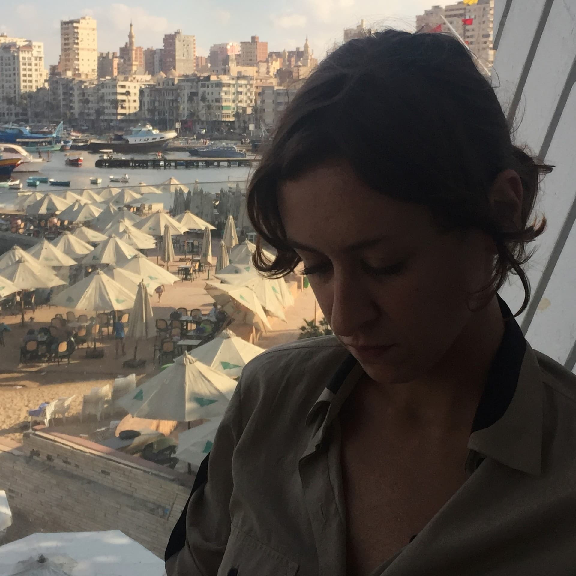 An image shows a portrait of Basma al-Sharif.
