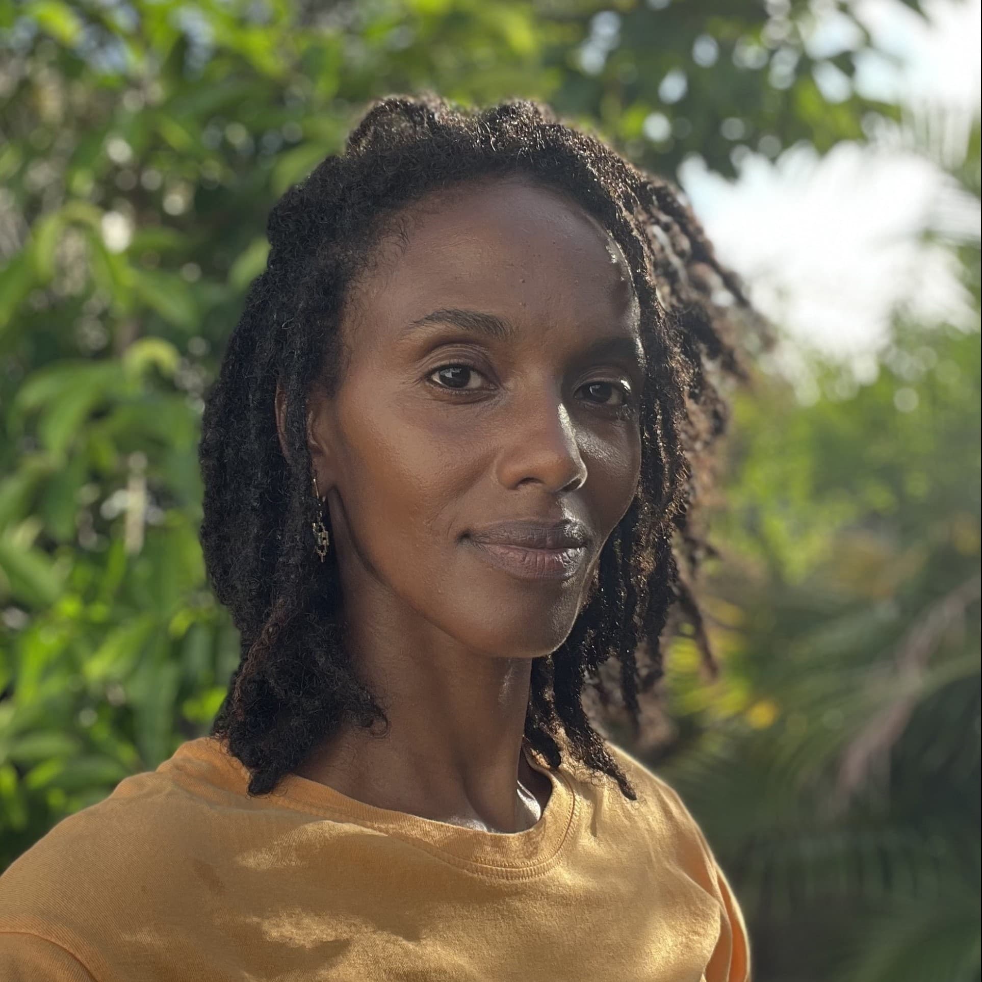 A photograph shows a portrait of Daniela Yohannes.