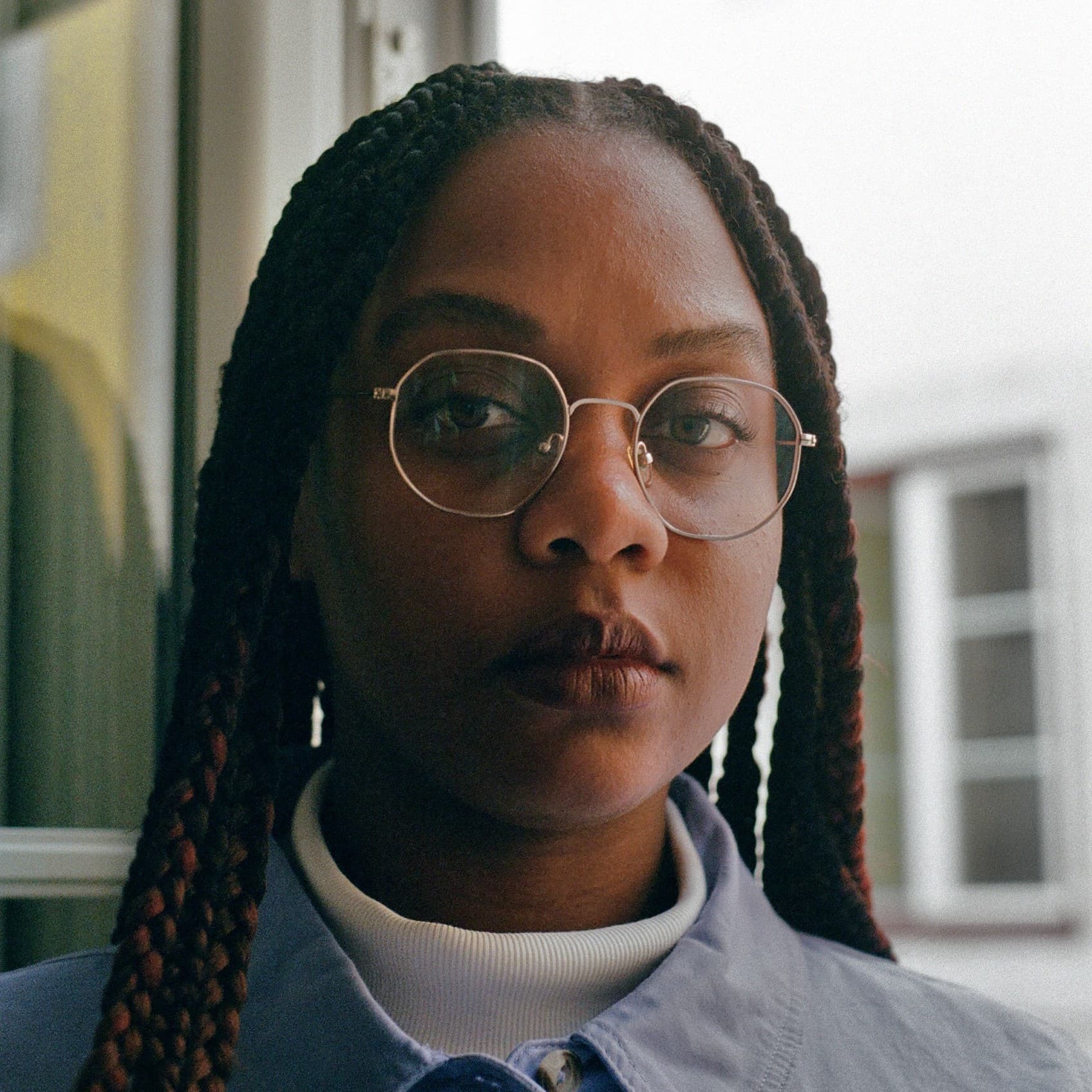 A photograph shows a portrait of Monica Sorelle.