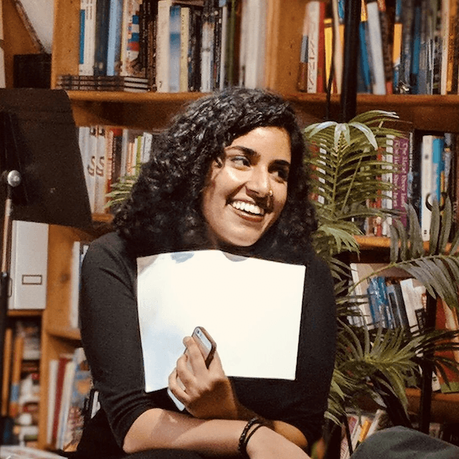 A photograph shows a portrait of Maryam Mir.