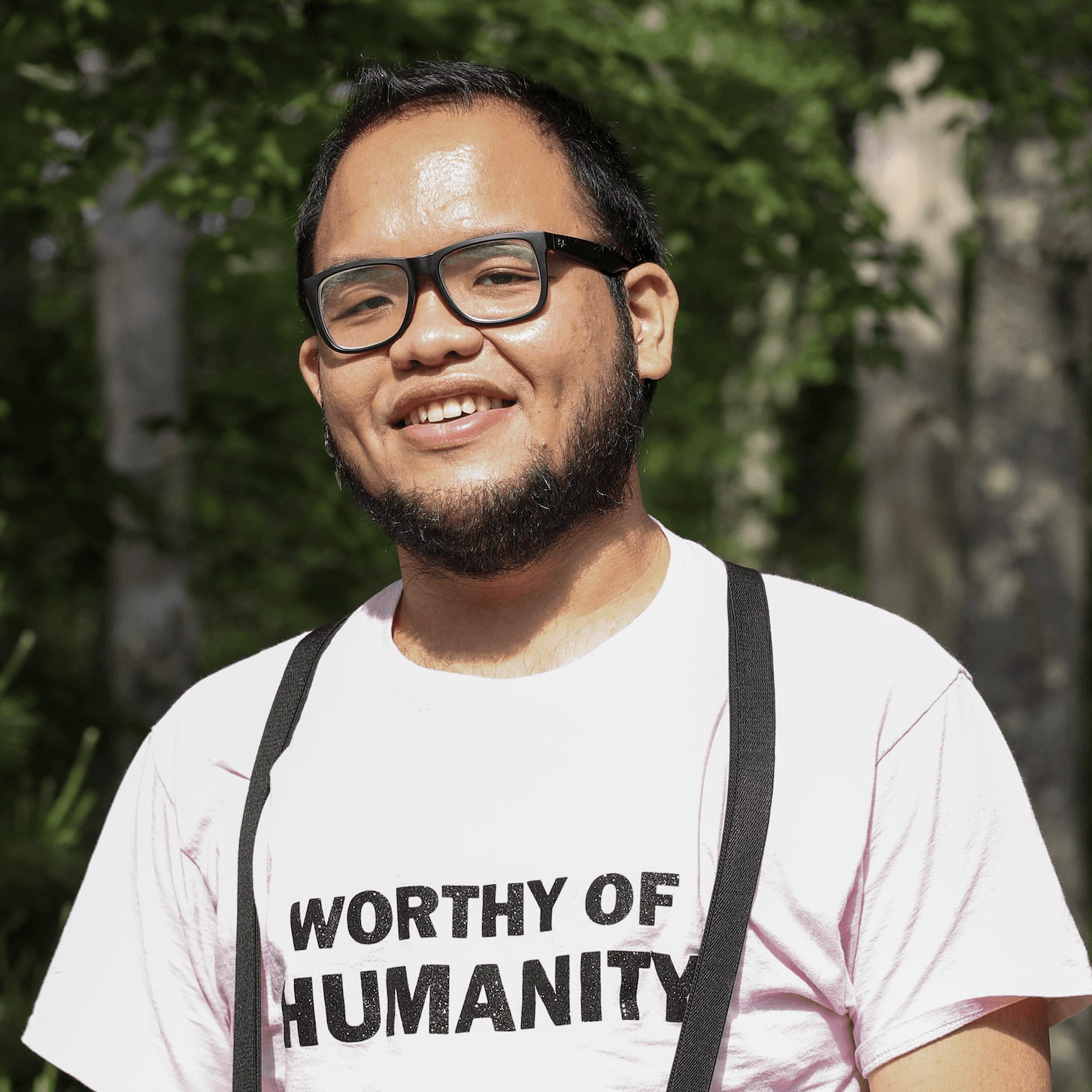 A photograph shows a portrait of Set Hernandez.