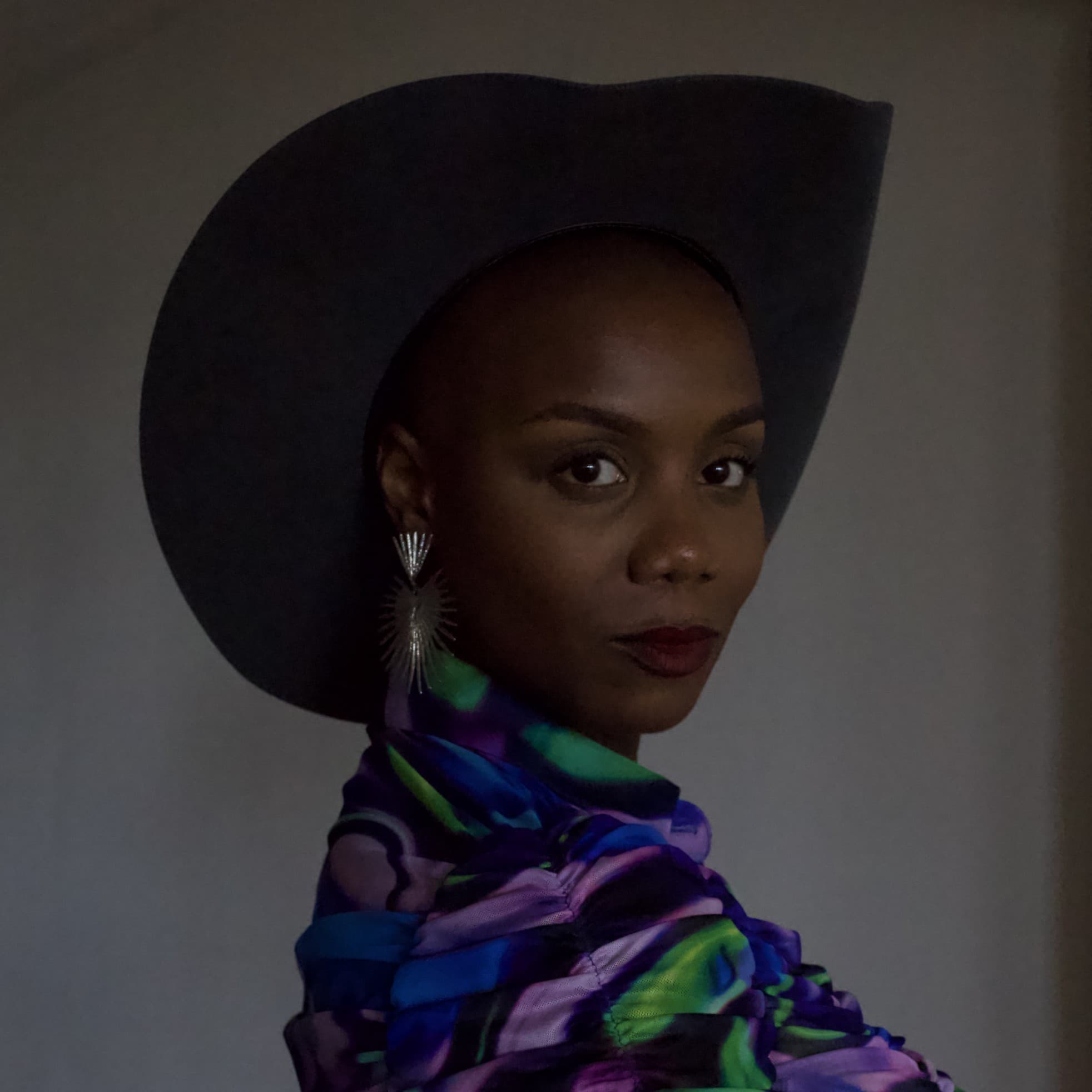 A photograph shows a portrait of Ja'Tovia Gary.