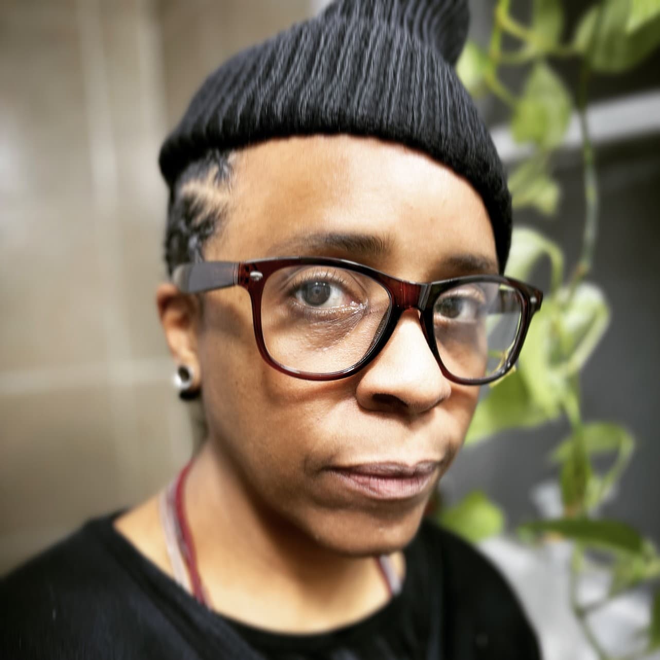 A photograph shows a portrait of M. Asli Dukan.