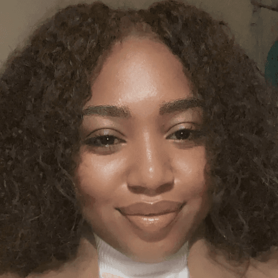 A photograph shows a portrait of Ellianne Baptiste.