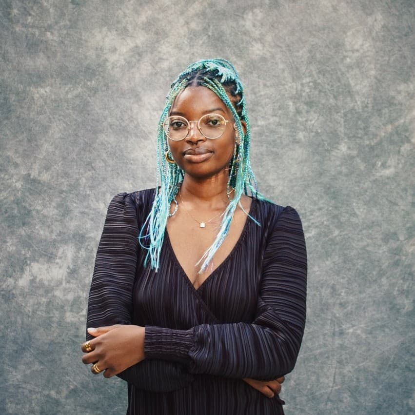 A photograph shows a portrait of Ife Oluwamuyide.