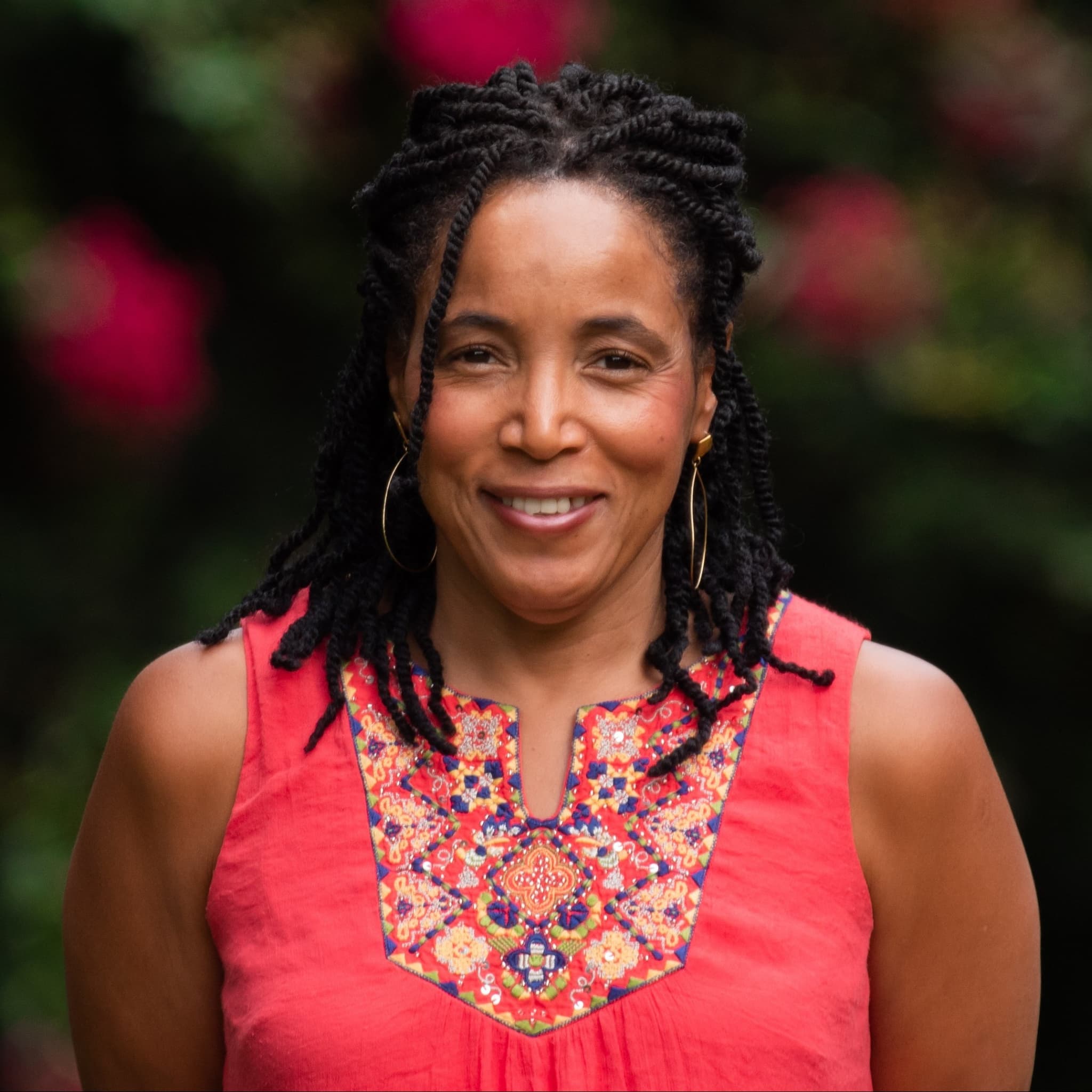 A photograph shows a portrait of Valerie Scoon.
