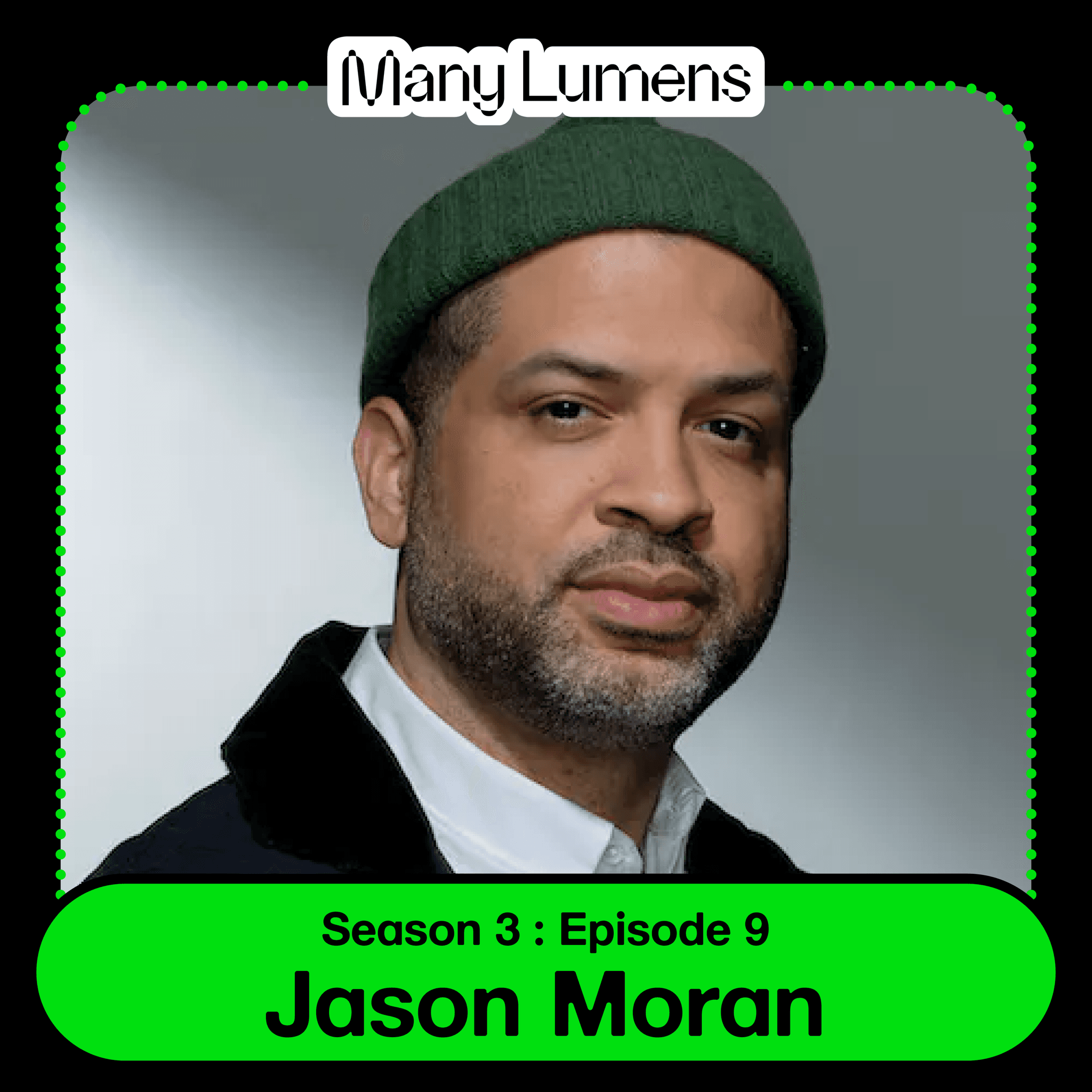 A headshot of Jason Moran. He is wearing a green beanie, a white crewneck and a black jacket. He has a serious expression and is looking directly into the camera.