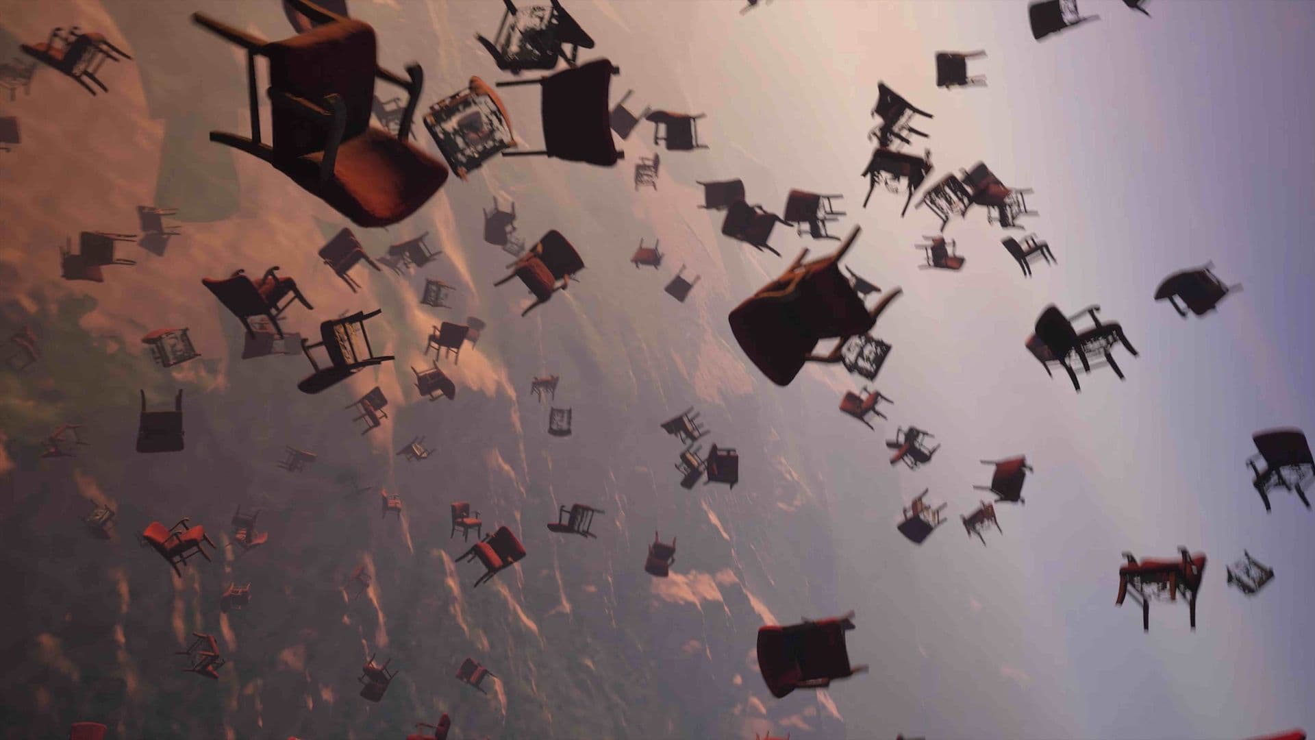 A film still from An Impossible Address shows dozens of chairs falling from the sky toward a desert landscape.