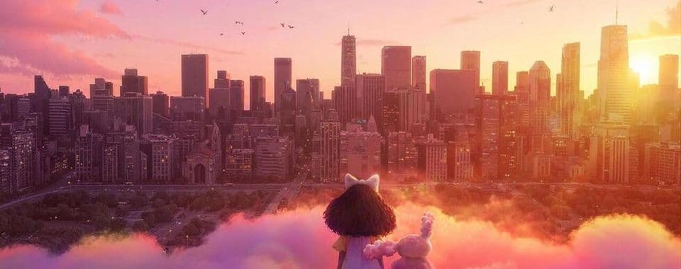 An animated film still from ChikaBOOM!! shows a young Black girl and a smaller pink creature sitting on a cloud facing the New York City skyline as the sun sets. The girl is wearing a pink bow and dress.