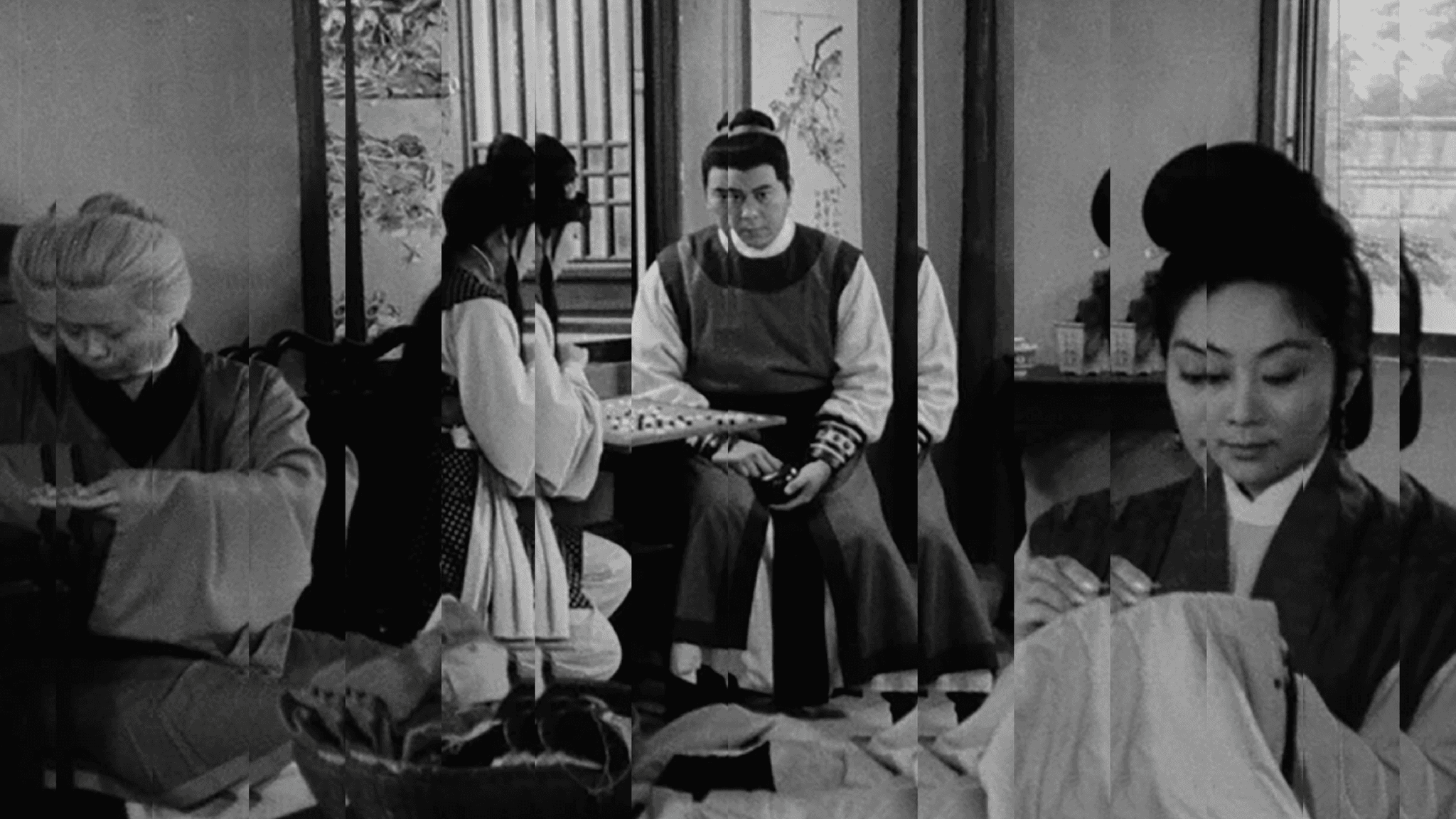 A black-and white still from The Arch (1968), dir. T'ang Shushuen of a group of people in a salon type setting in China. Two are playing a table game and one is sowing a cloth. The image is manipulated so that the pieces of the frame are slightly different.